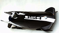 photo of bobsled in motion
