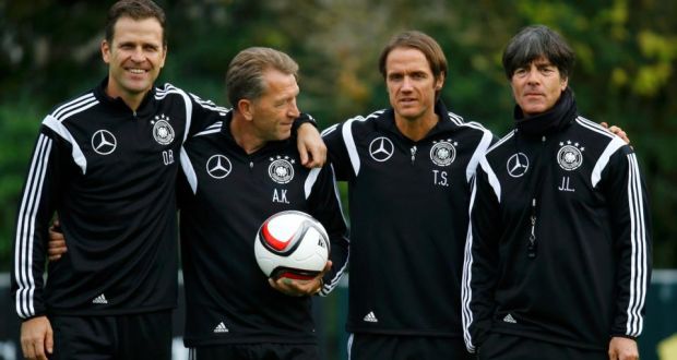 German national team coach Joachim Löw (right) with (from left) general manager Oliver Bierhoff, goalkeeper coach Andreas Koepke and coach assistant Thomas Schneider. Photograph: Kai Pfaffenbach/Reuters. 